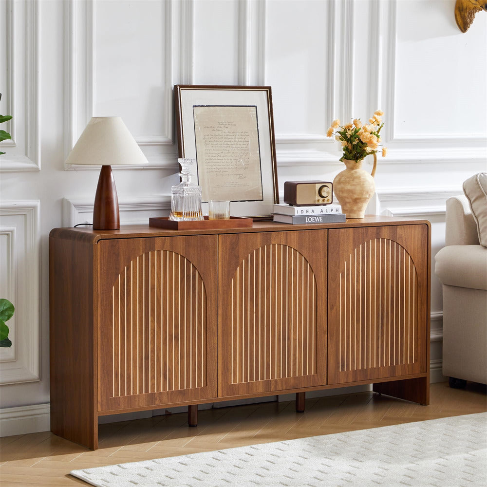 Wooden sideboard in a living room setting with decor items on top