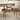 Wooden desk with computer setup in a modern office setting