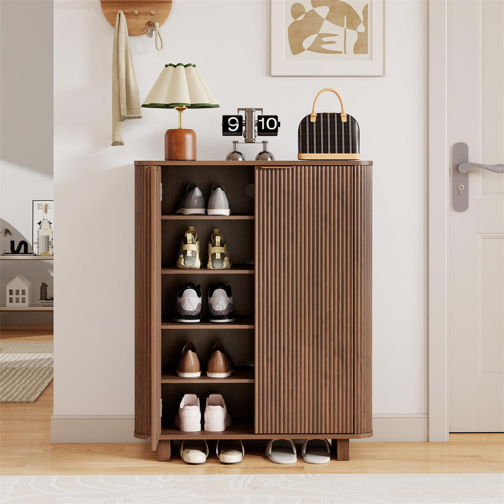 Wooden 5 Tier shoe cabinet with shoes inside in a room setting