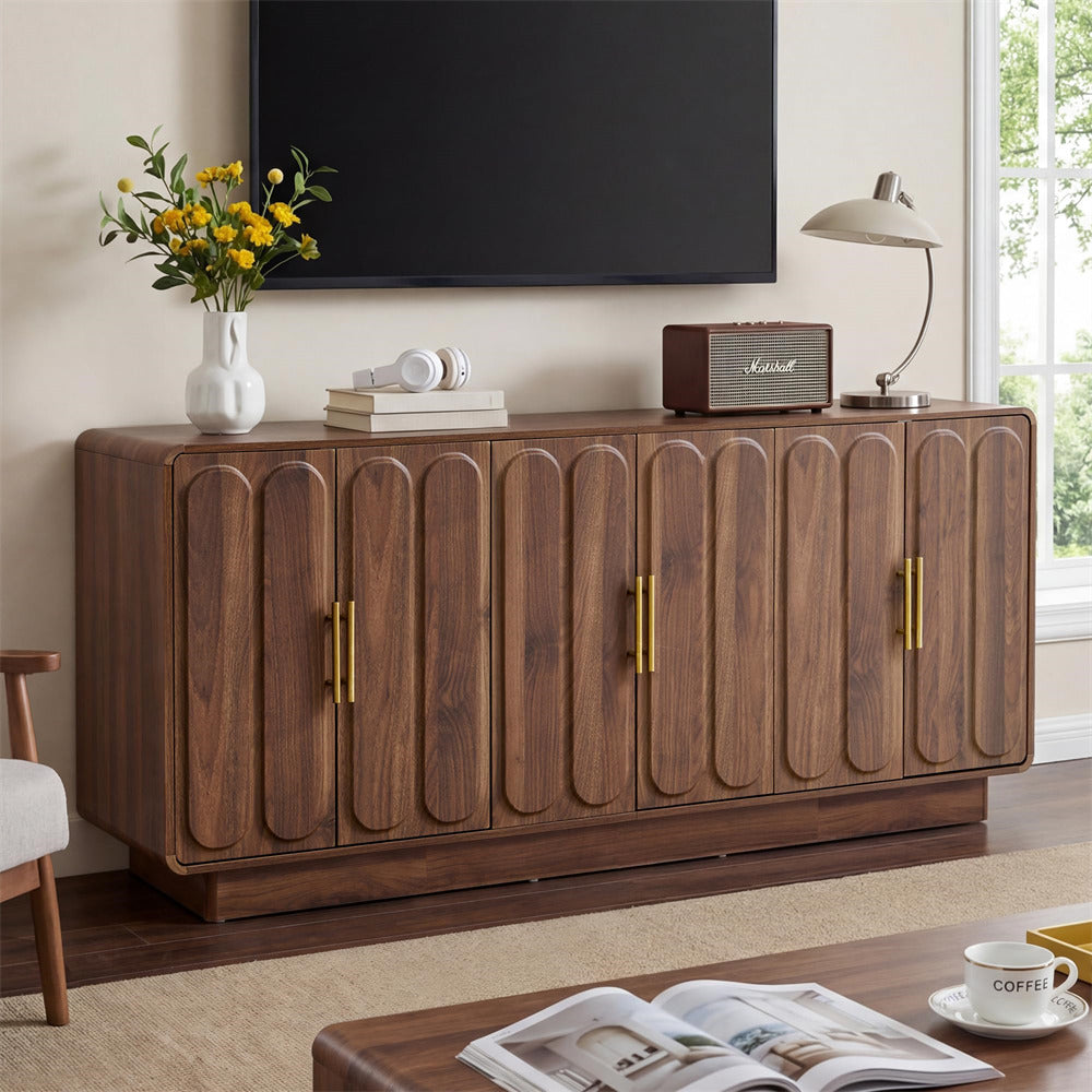 Wooden sideboard in a living room with decor items on top