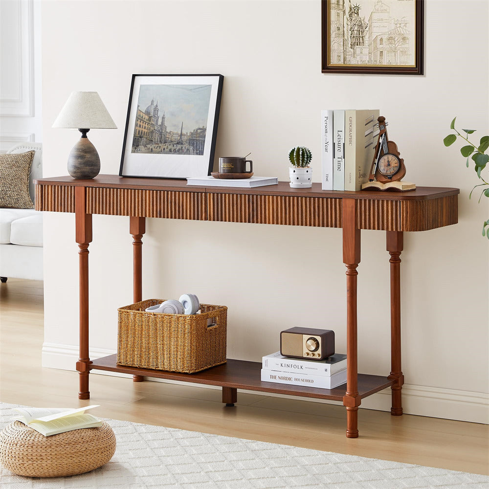 Wooden console table in a living room with decor items