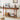 Wooden console table in a living room with decor items