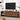 Wooden TV stand with a television mounted above it in a living room setting.