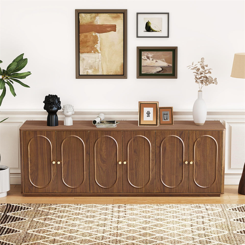 Wooden sideboard with decorative items in a living room setting