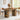 Wooden dining table with chairs in a room with large windows.