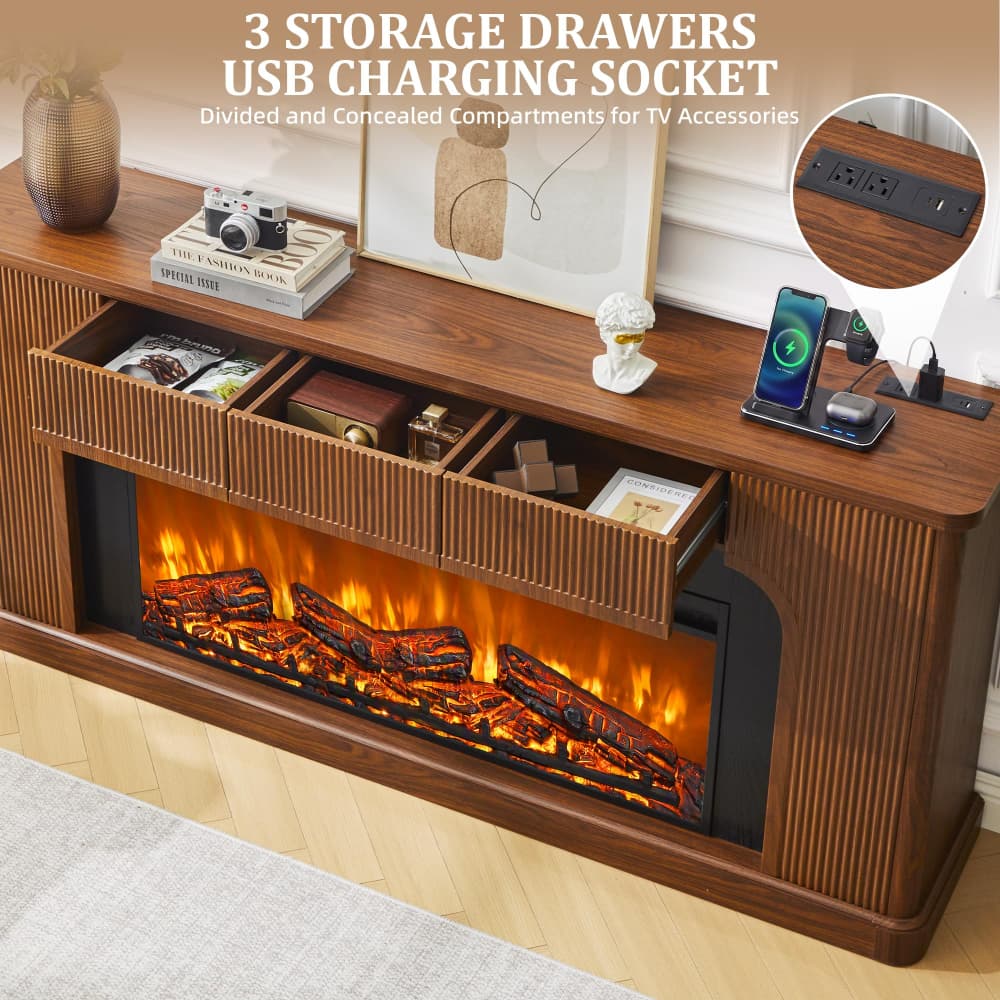 A walnut-finish electric fireplace TV stand with two open storage drawers, a concealed USB charging socket, and faux log fire effect. The stand is styled with books, a camera, a small bust, and a smartphone on a charging dock, with a circular inset showing the charging socket detail.