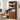 Wooden bookshelf with books and decor in a home office setting
