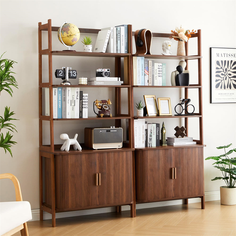 Wooden bookshelf with decorative items in a room with plants and a chair.
