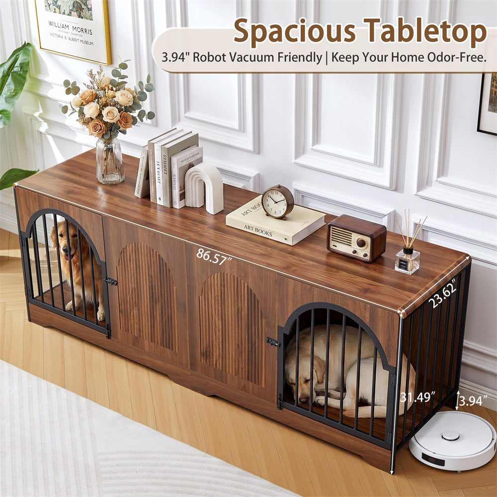 A wooden two-compartment robot vacuum cleaner storage cabinet with black metal doors, shown in a styled home setting with two dogs inside the compartments. The image includes dimension markings and a text banner at the top.