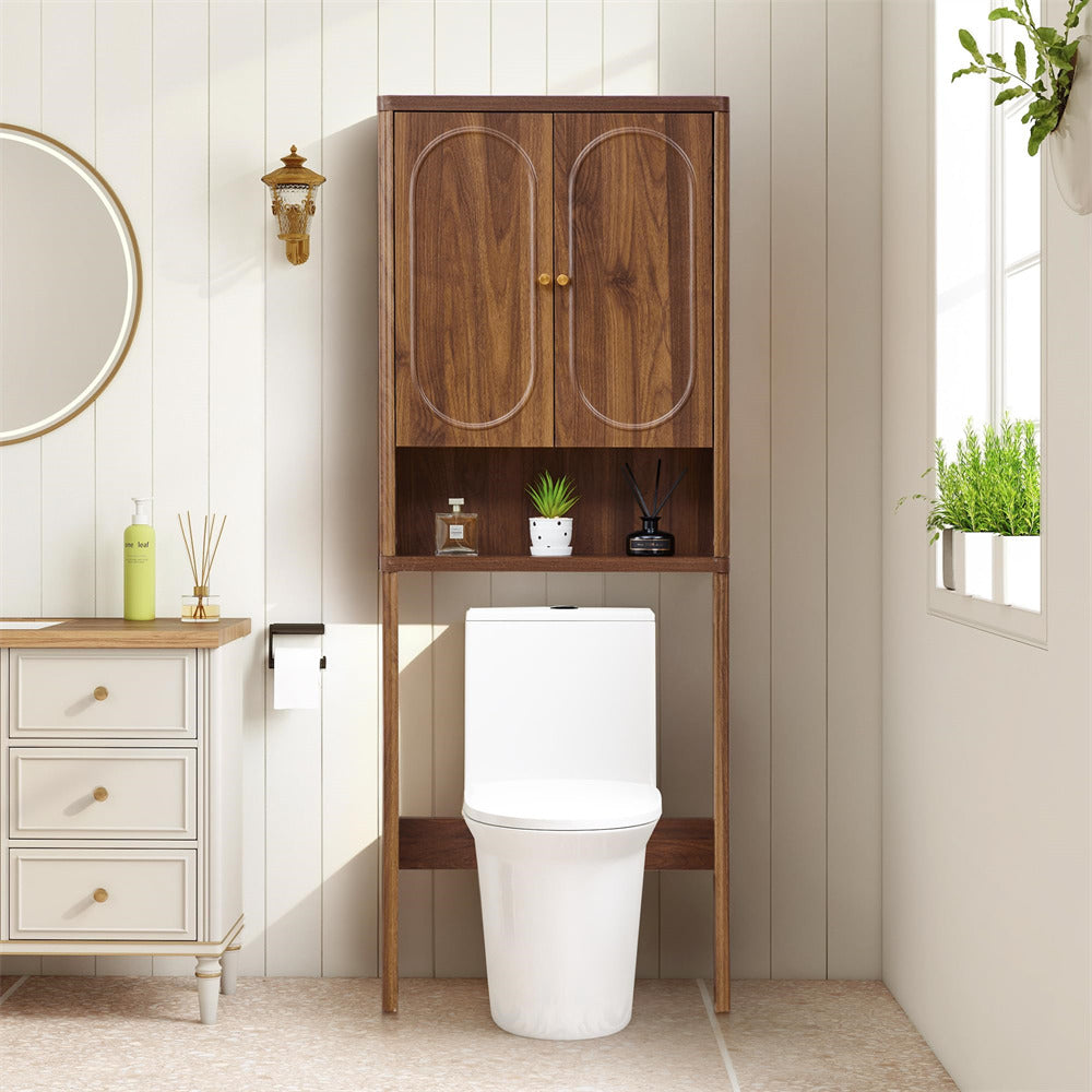 Bathroom with wooden over-the-toilet cabinet and white toilet.