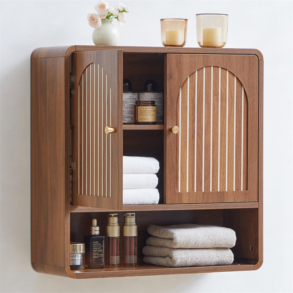Wooden cabinet with shelves containing towels and decorative items on a white background