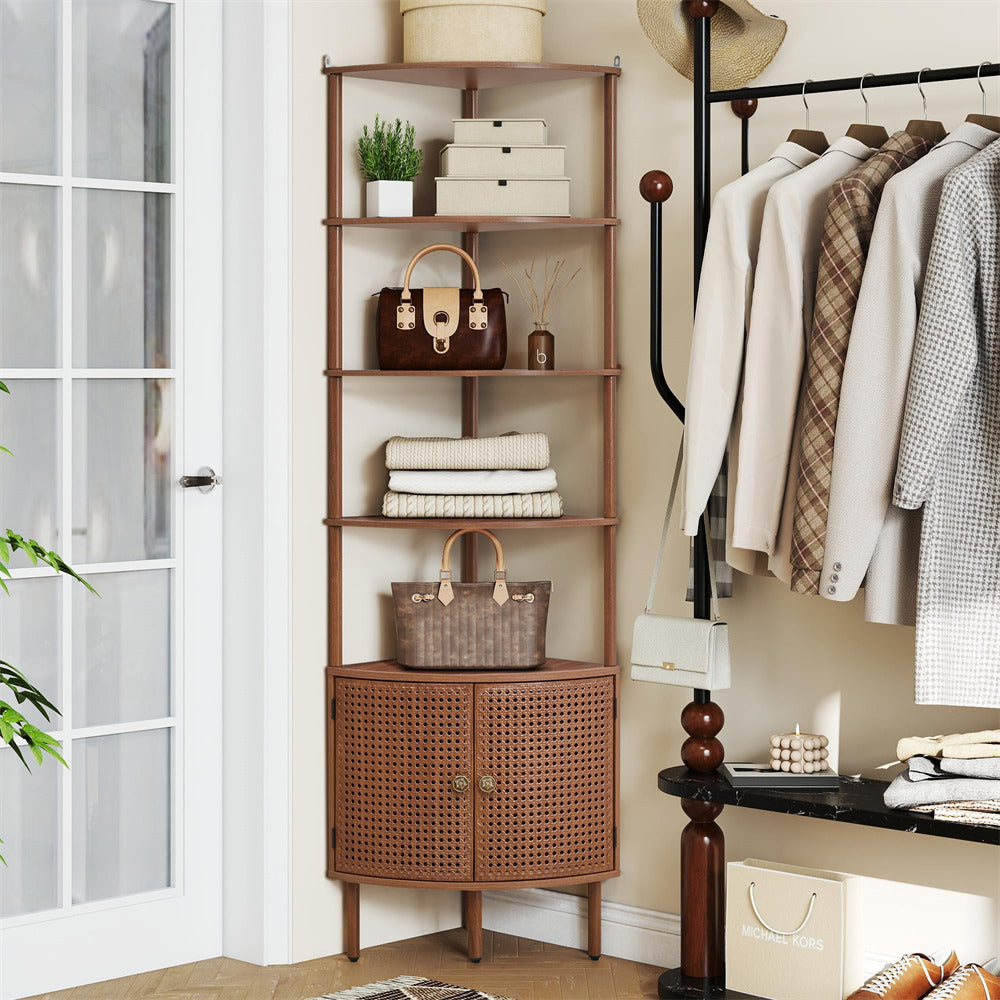 Wooden corner shelf with decorative items in a room with clothing and a plant.