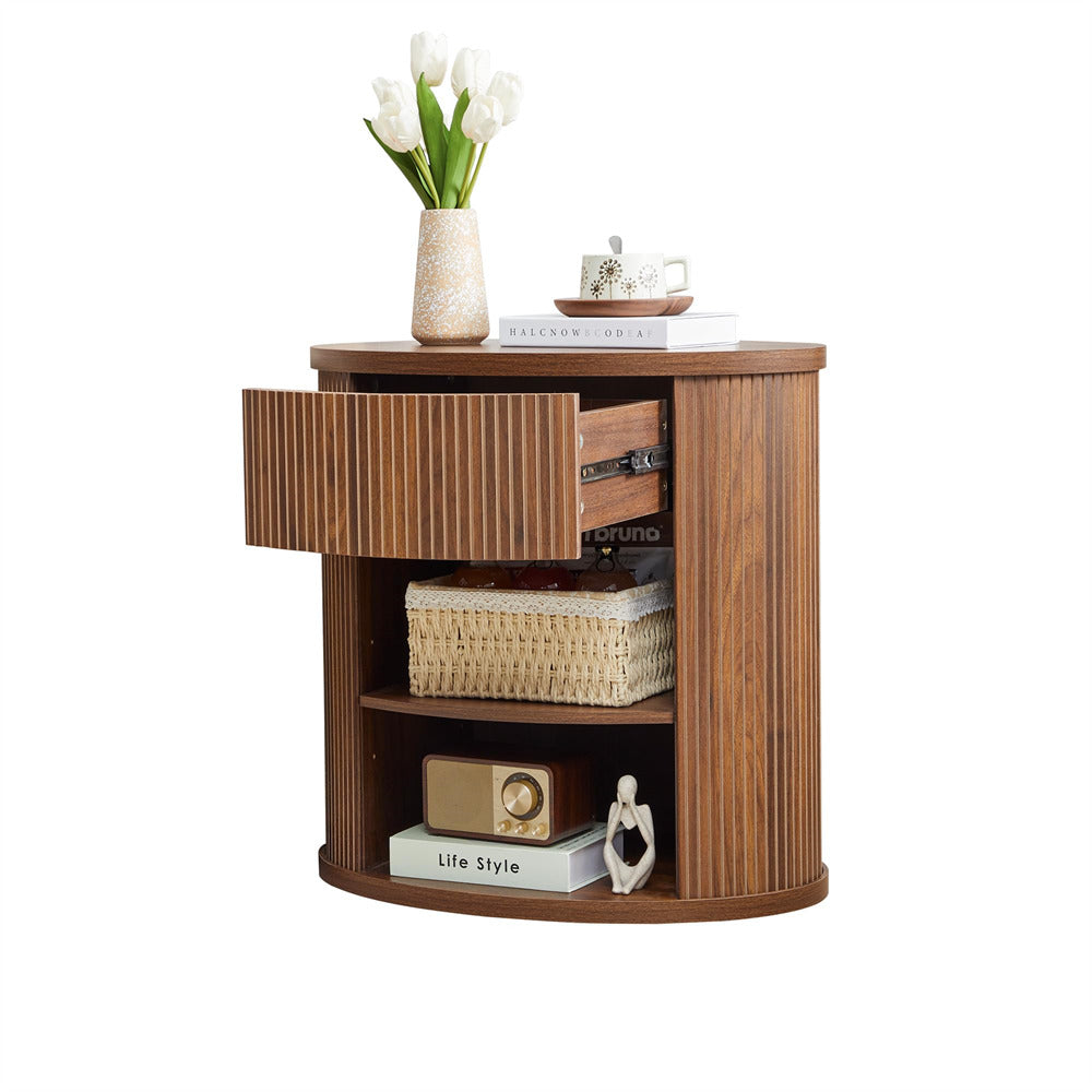 Wooden side table with decorative items on a white background