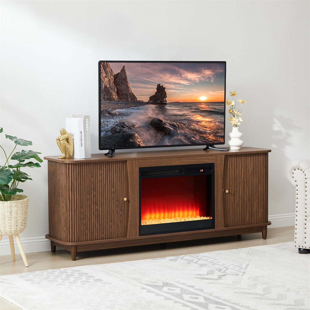 Wooden TV stand with electric fireplace displaying a scenic television screen in a living room setting.