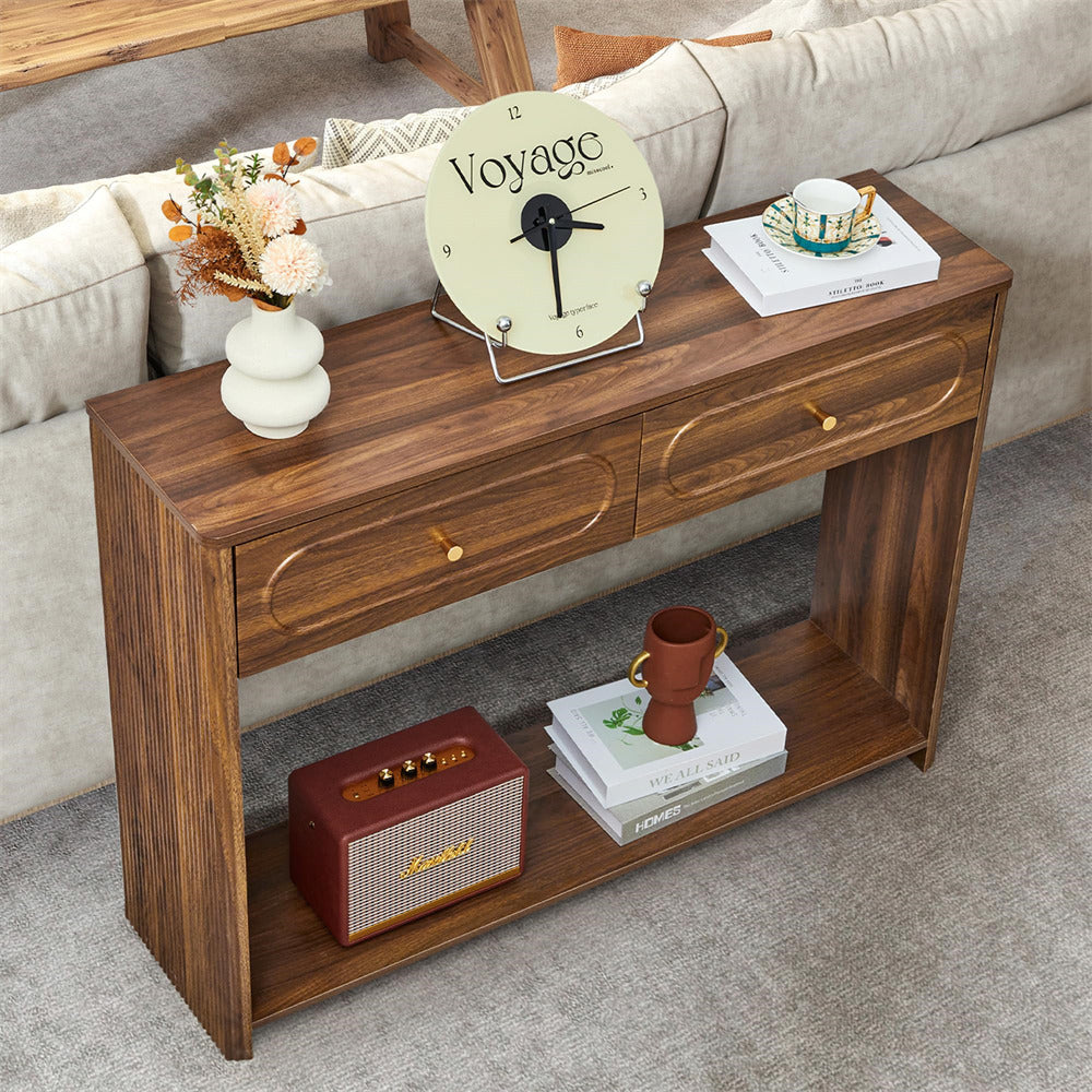 Wooden console table with decorative items in a living room setting