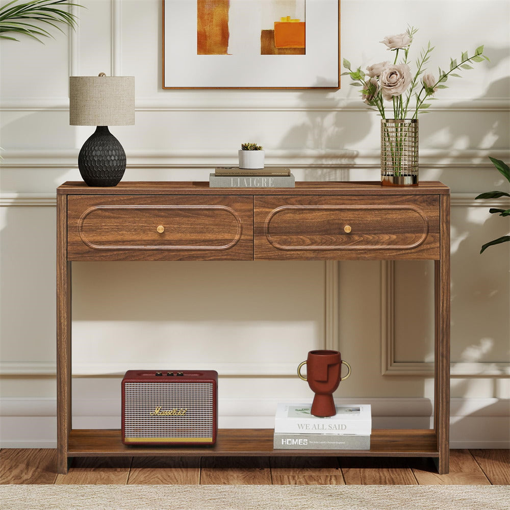 Wooden console table with decorative items in a room setting