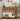 Wooden console table with decorative items in a room setting
