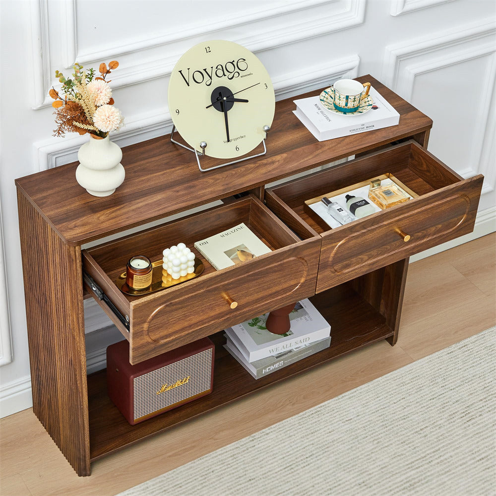 Wooden console table with open drawers in a room setting