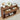 Wooden console table with open drawers in a room setting