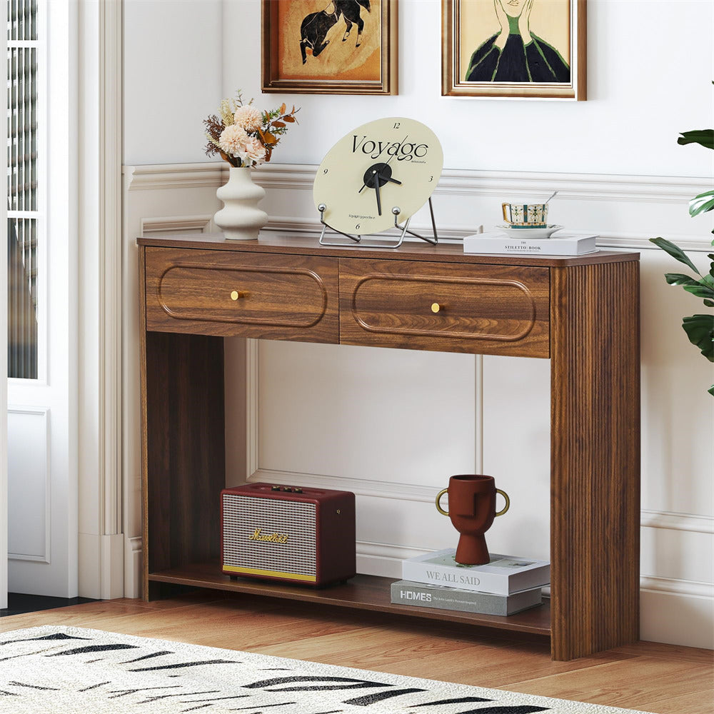 Wooden console table with decorative items in a room setting