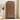 Wooden wardrobe with arched top in a room with a painting and chair.