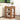 Wooden side table with shelves in a living room setting