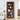 Wooden bookshelf with decorative items in a living room setting