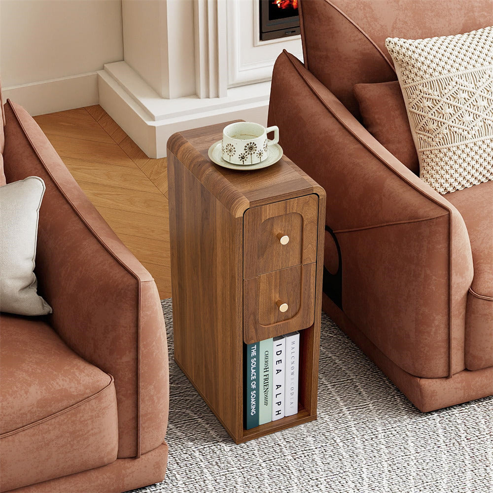 Brown sofa with a wooden side table and a cup of tea in a living room setting.