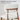 An upholstered dining chair with a light beige seat and back cushion and medium brown wooden frame, shown with text reading 'Ergonomic Barrel Back Support' and yellow arrows indicating curved back support.