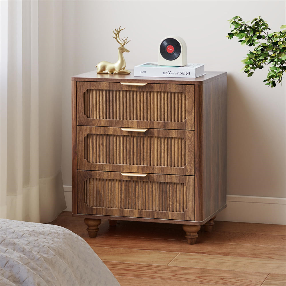 Wooden nightstand with decorative items in a bedroom setting