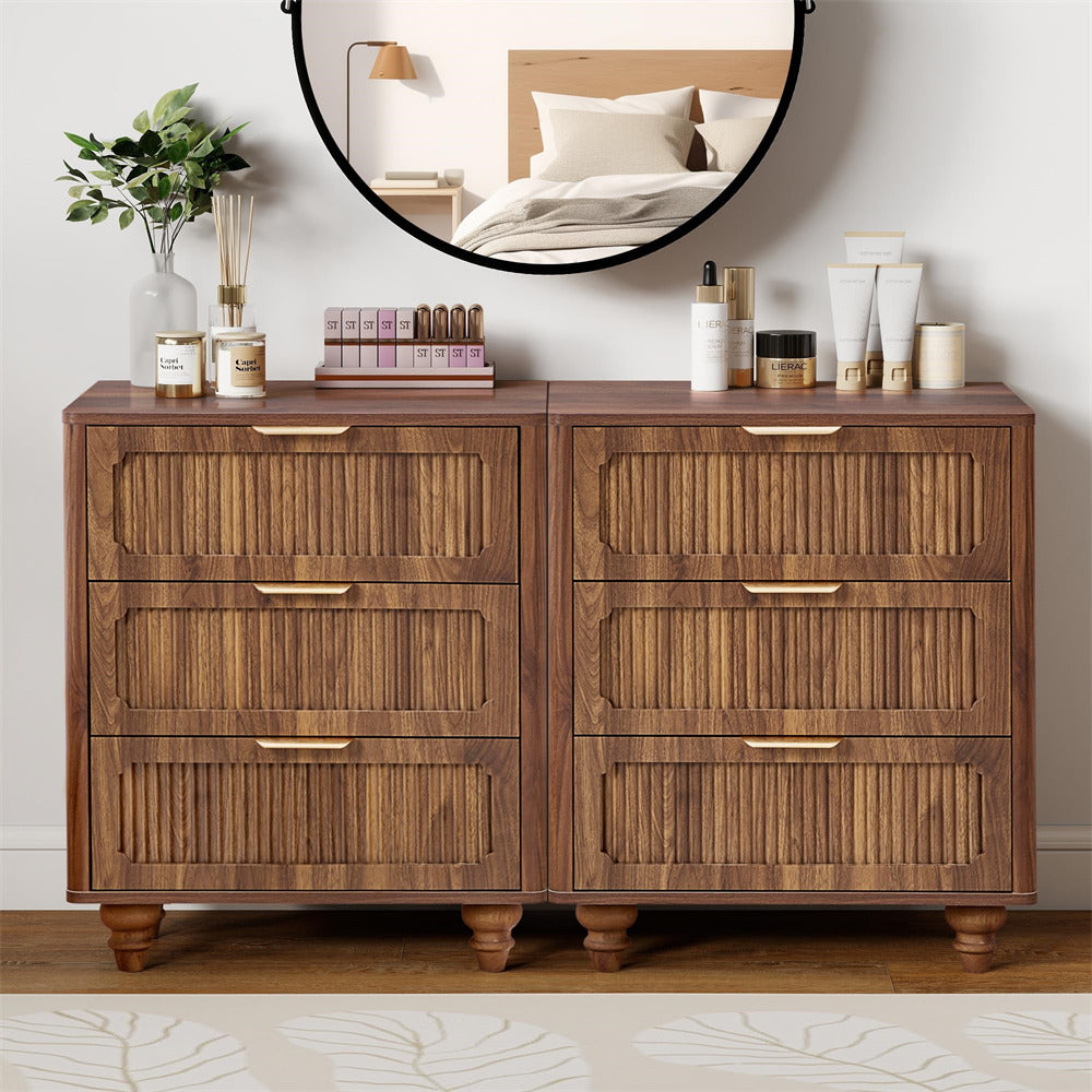 Wooden dresser with decorative items in a bedroom setting