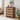Wood 4 drawer dressers with woven drawer fronts in a living room setting.