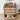 Wooden dresser with open drawer containing headphones, on a light wooden floor with a plant in the corner.