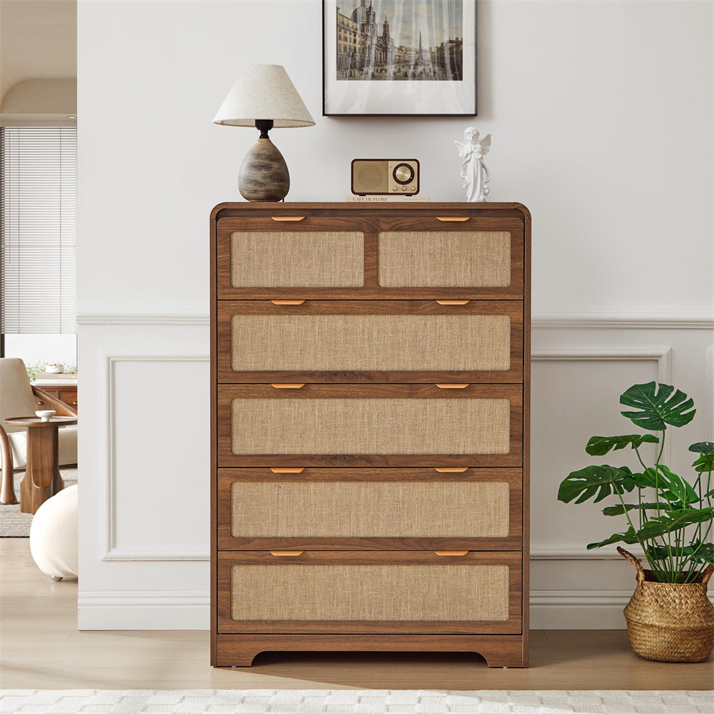 Wooden dresser with woven drawer fronts in a room setting with decor elements.