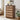 Wooden dresser with fabric drawers in a living room setting
