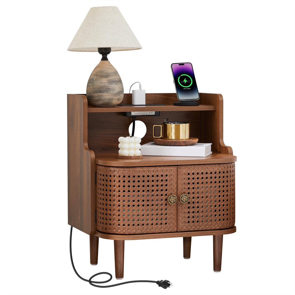 Wooden side table with wicker design, lamp, phone, and other items on a white background