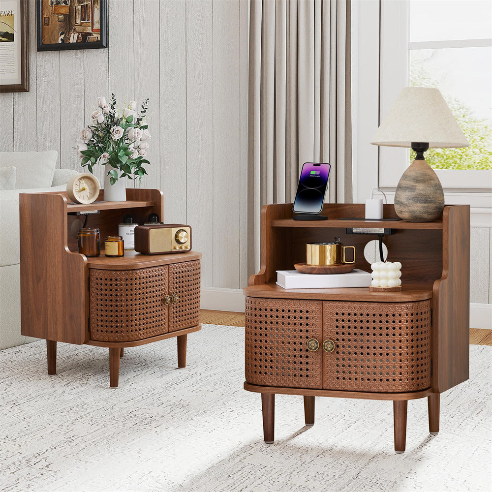 Two wooden side tables with wicker designs in a living room setting.