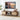 Wooden TV stand with a television displaying a sunset over water scene, in a room with a lamp and decorative items.