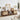 Wooden entertainment console in a living room with decor items.