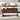 Wooden coffee table with lift-top design in a living room setting