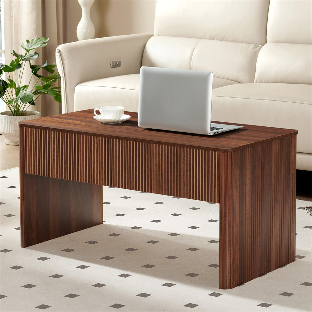 Wooden coffee table with a laptop and cup in a living room setting