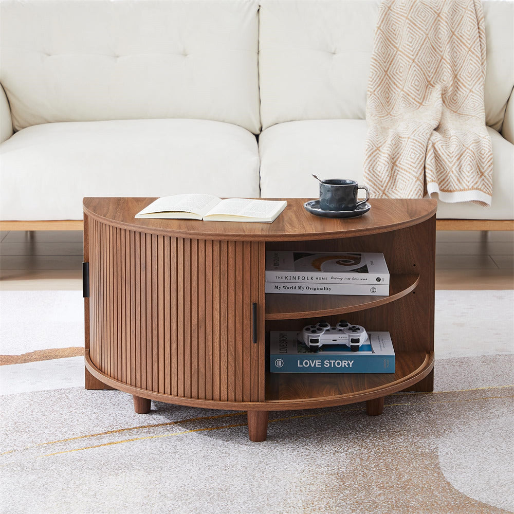 Wooden coffee table with books and a mug in a living room setting