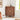 Wooden cabinet with decorative elements in a room setting