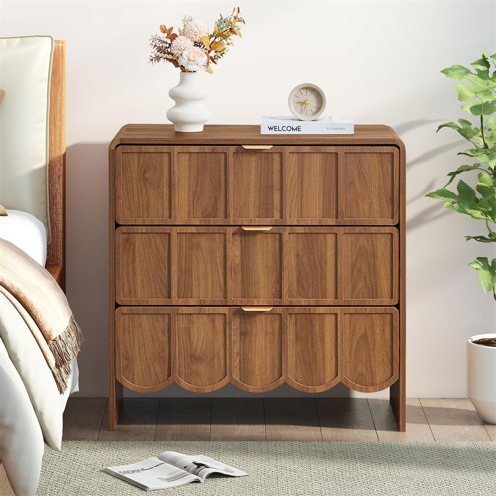 Wooden dresser with decorative items in a bedroom setting