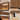 Wooden furniture with gold handles, wave panel design, smooth slide mechanism, and anti-tipping feature.
