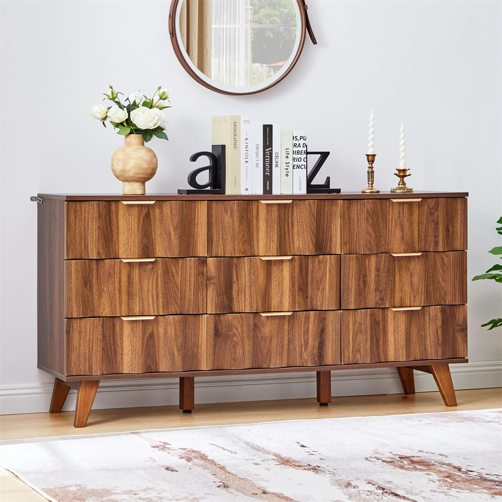 Wooden dresser with decorative items in a room setting