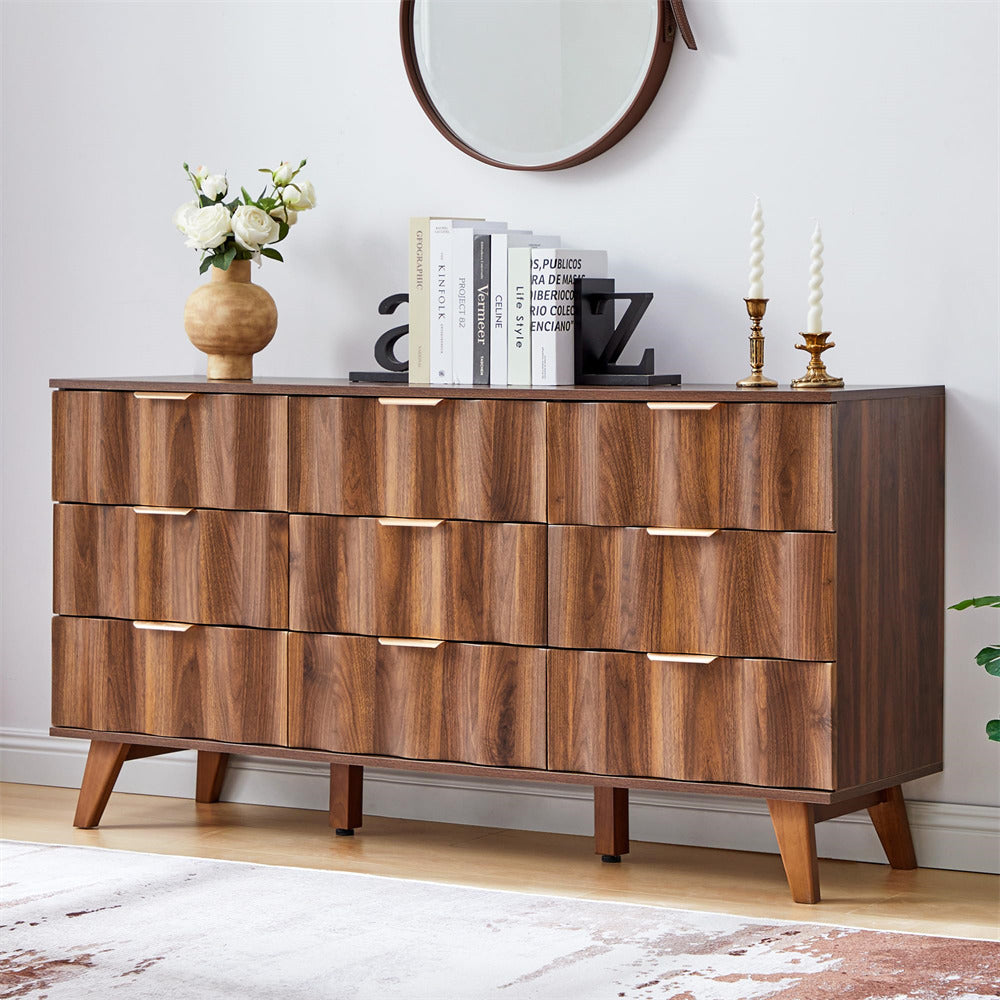 Wooden dresser with decorative items in a room setting