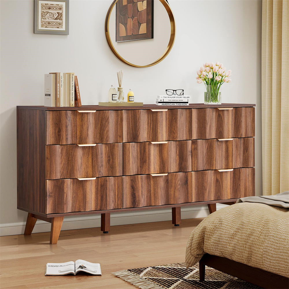 Wooden dresser in a bedroom with decor items on top