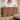 Wooden dresser in a bedroom with decor items on top