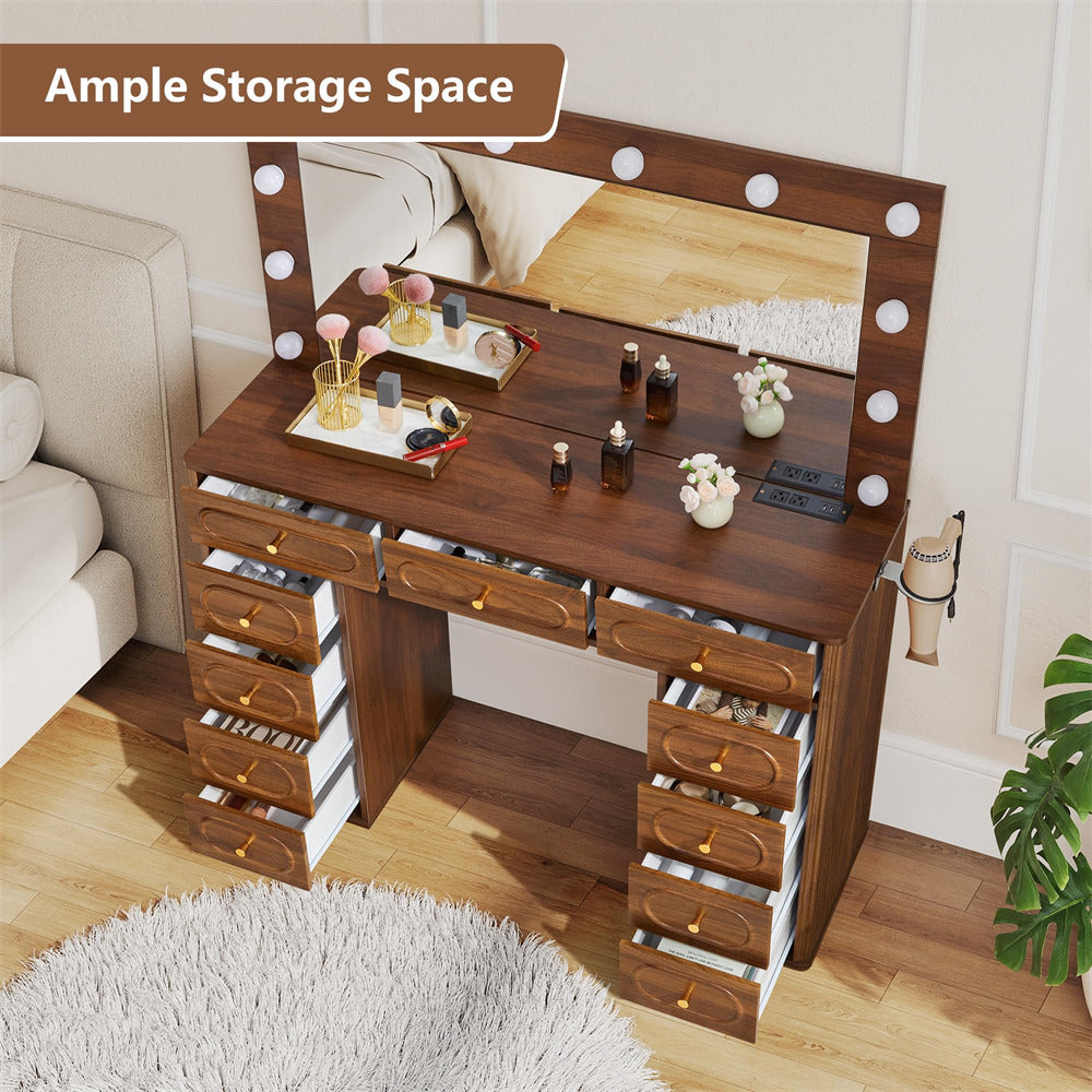 Wooden vanity table with mirror and multiple drawers in a room setting.